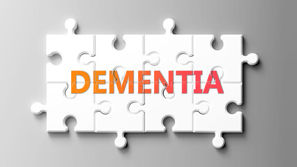 Dementia complex like a puzzle - pictured as word dementia on a puzzle pieces to show that dementia is complex and needs cooperating pieces that fit together. ,3d illustration