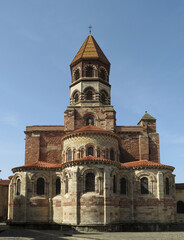 Romanesque Abbey of Saint-Austremoine. Issoire. Auvergne. France. 12th century. General view of the apses and the bell tower. 