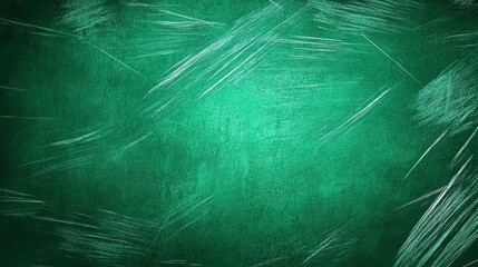 Textured green surface with faint scratches and marks, ideal for background or design projects