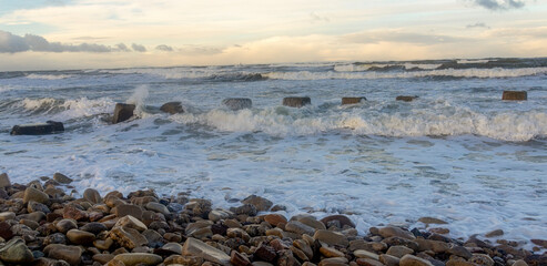 Waves crashing along the coast during a storm