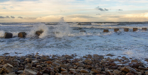 Waves crashing along the coast during a storm