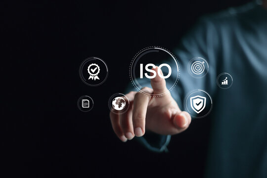 ISO standards quality control concept, assurance warranty business, compliance, global standards, and International organization for standardization. Person touching ISO icon on virtual screen.