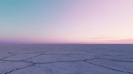 Expansive View of Cracked Earth Under Soft Horizon at Dusk