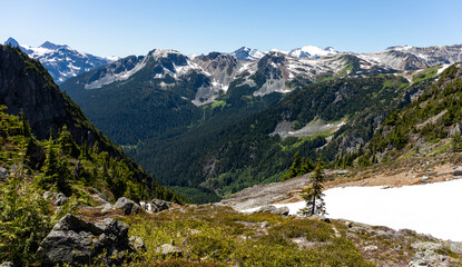 The last of the winter snow melts on a Canadian mountain peaks