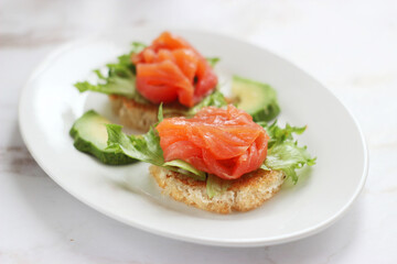 Appetizer with trout and greens