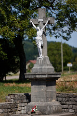 Calvary in the countryside.  jesus on the cross.