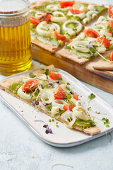 Almond Flour Tarte Flambée with Pesto and Onions