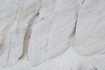 Limestone quarry. Open-cast mining. Chalk hills. Chalk surface. Natural limestone. 
