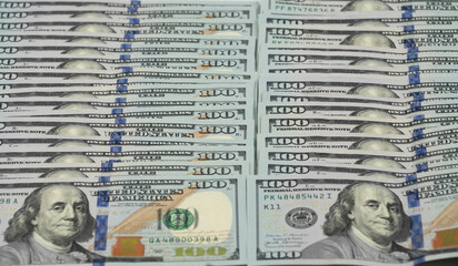 American dollar banknotes on a white background close-up.