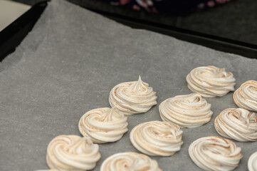 Swirls of sweetness line the baking tray, ready for a delicious oven transformation