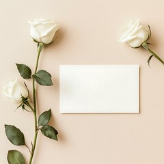 Fototapeta premium Mockup of an A5 blank card on a light beige solid background, white rose stems placed on one side, top view, minimal