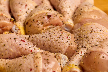 chicken legs on a wooden table