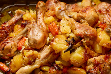 Chicken thighs with oven-baked vegetables