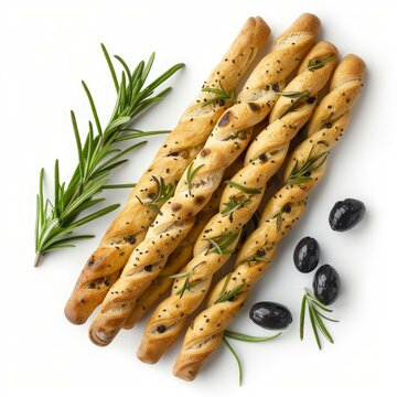 Delicious freshly baked breadsticks seasoned with herbs and spices are lying on a white surface with black olives and rosemary nearby