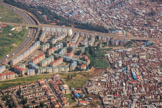 Modern housing (left) and the Kibera slum (right) in Nairobi.