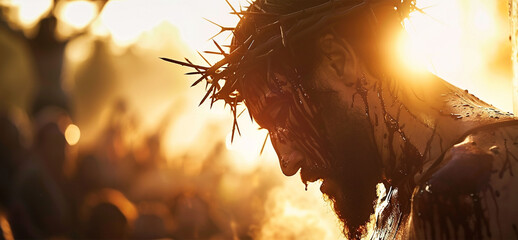 Close-up portrait of christ wearing crown of thorns carrying wooden cross eyes closed depicting pain and suffering easter season