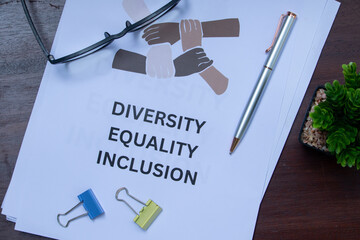 Diversity, Equality, and Inclusion Document on Desk – Workplace Culture and Policy Concept