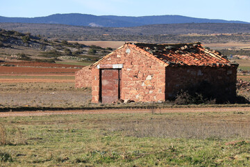 Abandoned stone house in the countryside in Peracense village, Spain