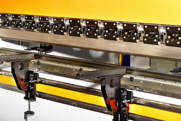 Precision metal bending equipment in a modern manufacturing facility showcases advanced technology