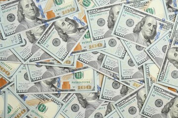 Big amount of american USD hunderd dollar bills banknotes close up