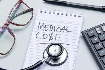 Stethoscope, calculator, and notebook combined to analyze and manage medical expenses.