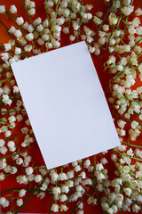 spring postcard layout with a bouquet of lilies of the valley