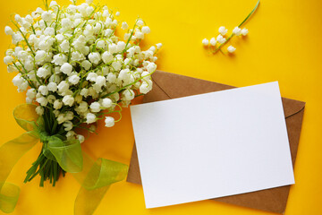 spring postcard layout with a bouquet of lilies of the valley
