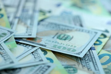 Big pile of Euro and USD banknotes. Many european and united states dollars