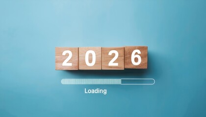 wooden blocks forming 2026 with a loading bar and loading text on a clean blue background, symbolizing progress, transition, and the concept of new year time