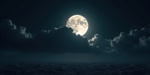 Fototapeta premium Serene Night Scene Full Moon Illuminating Cloudscape Over a Misty Landscape