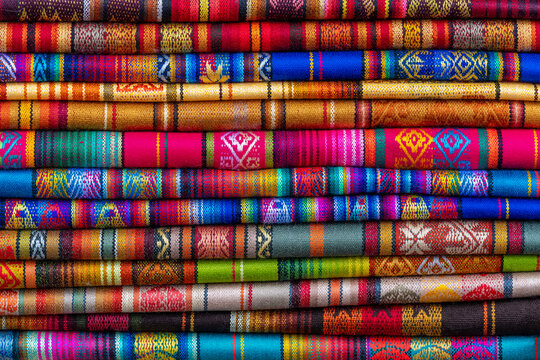 Traditional Andes textiles and fabrics on art and craft market, Otavalo, Ecuador. 