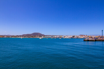 Docking marina in Fuerteventura with blue skies and calm sea