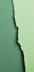 Green torn paper revealing textured layer