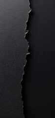 Torn black paper with textured background