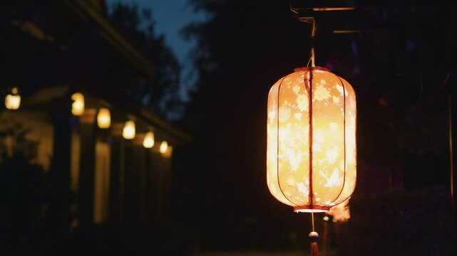 Luminous red paper lanterns hanging, casting soft light against shadowy architectural background, highlighting traditional chinese festival decorative elements