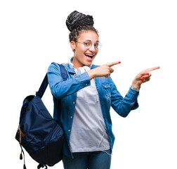 Young braided hair african american student girl wearing backpack over isolated background smiling...