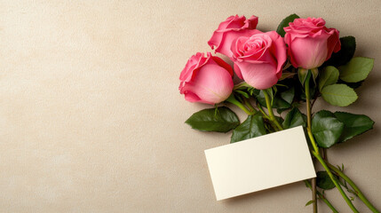 bouquet of vibrant pink roses lies on textured surface next to blank card, evoking sense of romance and elegance. Perfect for Valentine Day or special occasions
