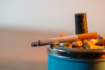 Cigarette smoking, unhealthy nicotine addiction.