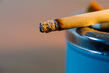 Cigarette smoking, unhealthy nicotine addiction.