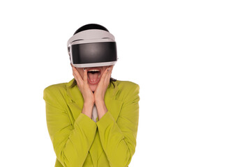 Excited woman experiences virtual reality in stylish green blazer