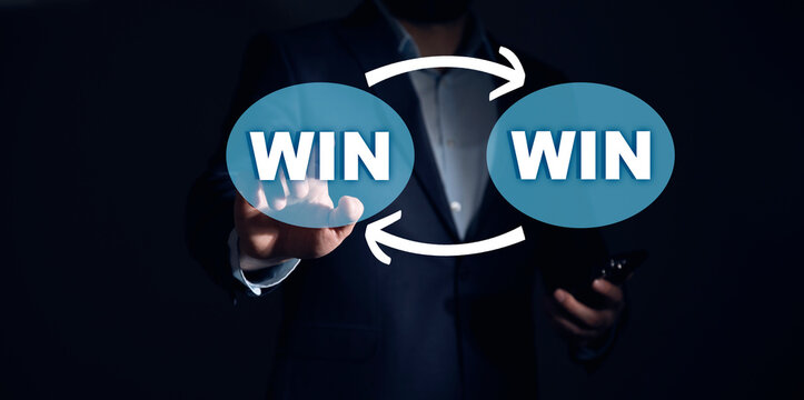 WIN WIN Businessman touching a touch screen