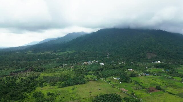 Aerial Drone View Of Pueh Village,With Paddy Field And Back Ground Mountain,Sarawak,Borneo,