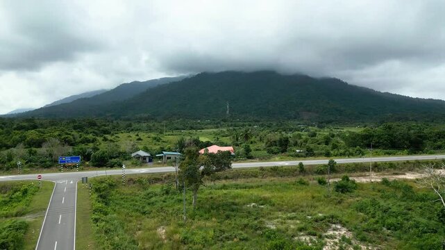 Aerial Drone View Of Pueh Village,With Paddy Field And Back Ground Mountain,Sarawak,Borneo,