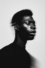 Monochrome Blurred Portrait of Contemplative Person in Motion