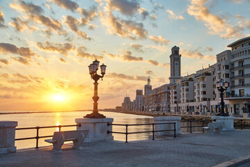 Fototapeta premium Bari seafront. Colorful amazing sunset. Coastline and city view.