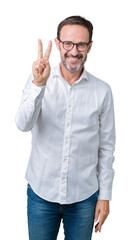 Handsome middle age elegant senior business man wearing glasses over isolated background showing and pointing up with fingers number two while smiling confident and happy.