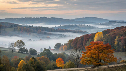 Obraz premium The Serene Fog Enveloping Autumn Hills at Dawn