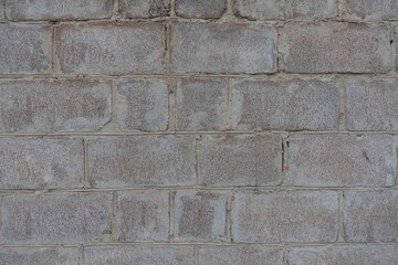 Close shot of whitewashed wall made of concrete masonry units