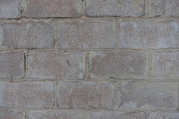 Close view of whitewashed wall made of concrete masonry units