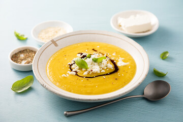 Homemade pumpkin soup with Feta cheese